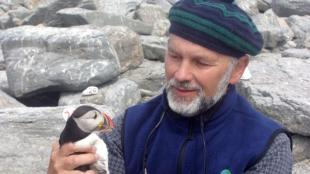 Stephen Kress with Puffin at Egg Rock